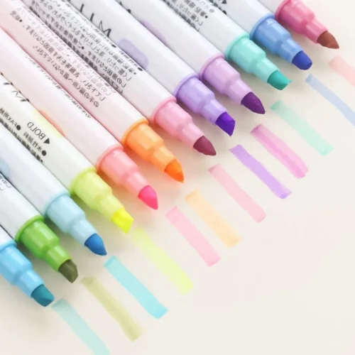 A neat row of colorful highlighters leaving neat ink lines on the page beneath them