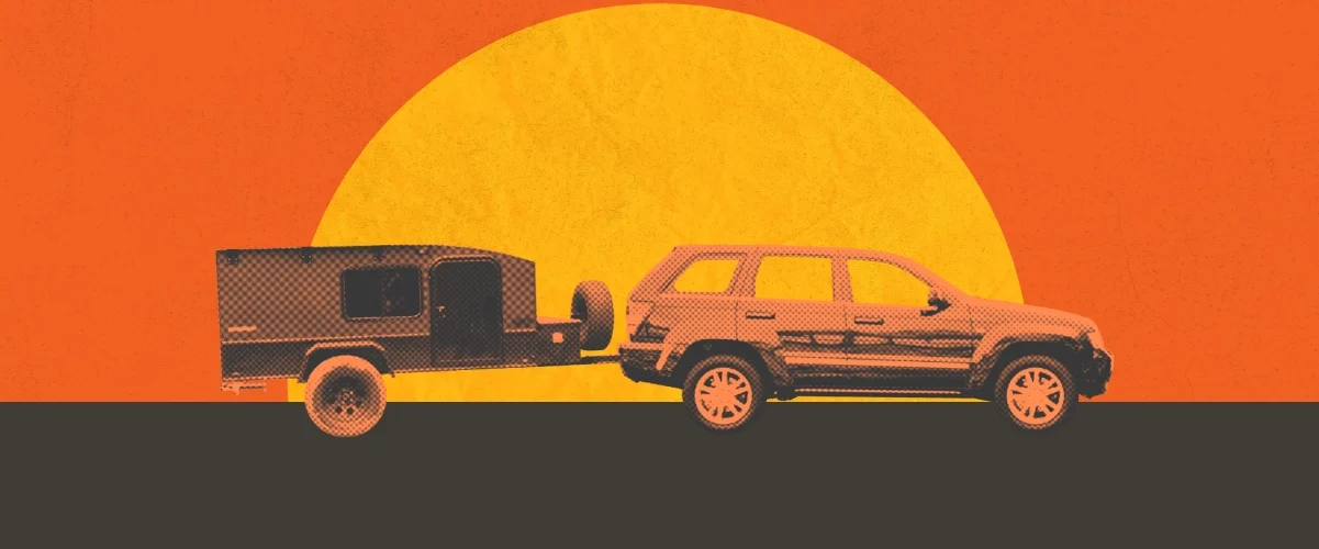 An SUV pulling a camper against an abstract sunset