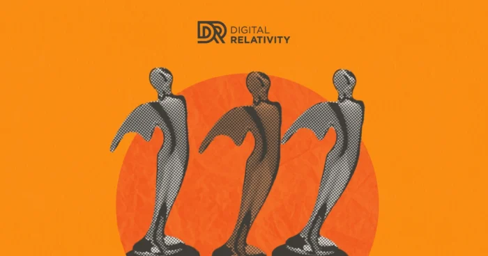 Three metallic award trophies on orange background with Digital Relativity logo in top left corner.