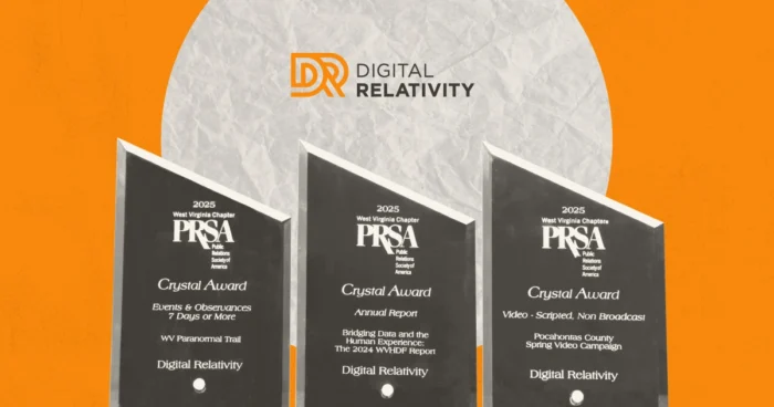 Three PRSA Crystal Award trophies displayed against orange background with Digital Relativity logo above.