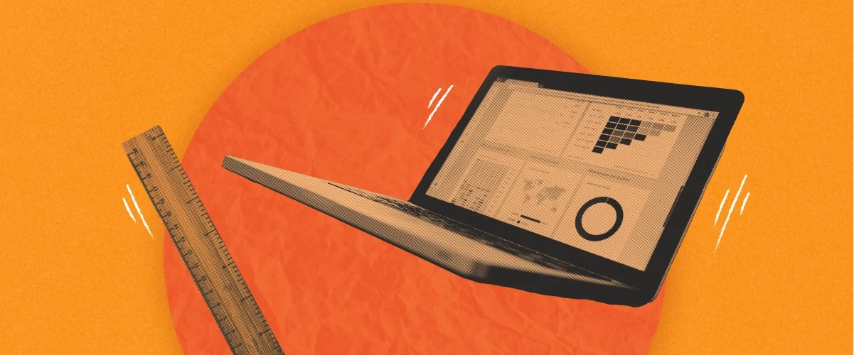 A tablet displaying charts and graphs, balanced on a ruler, against an orange background.