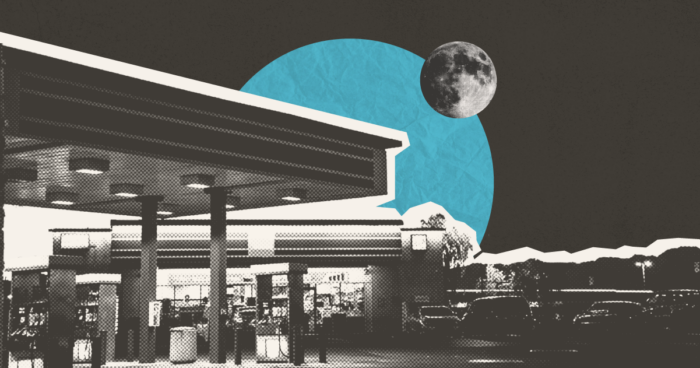 Black-and-white gas station at night with a large teal circle and full moon in the dark sky above.