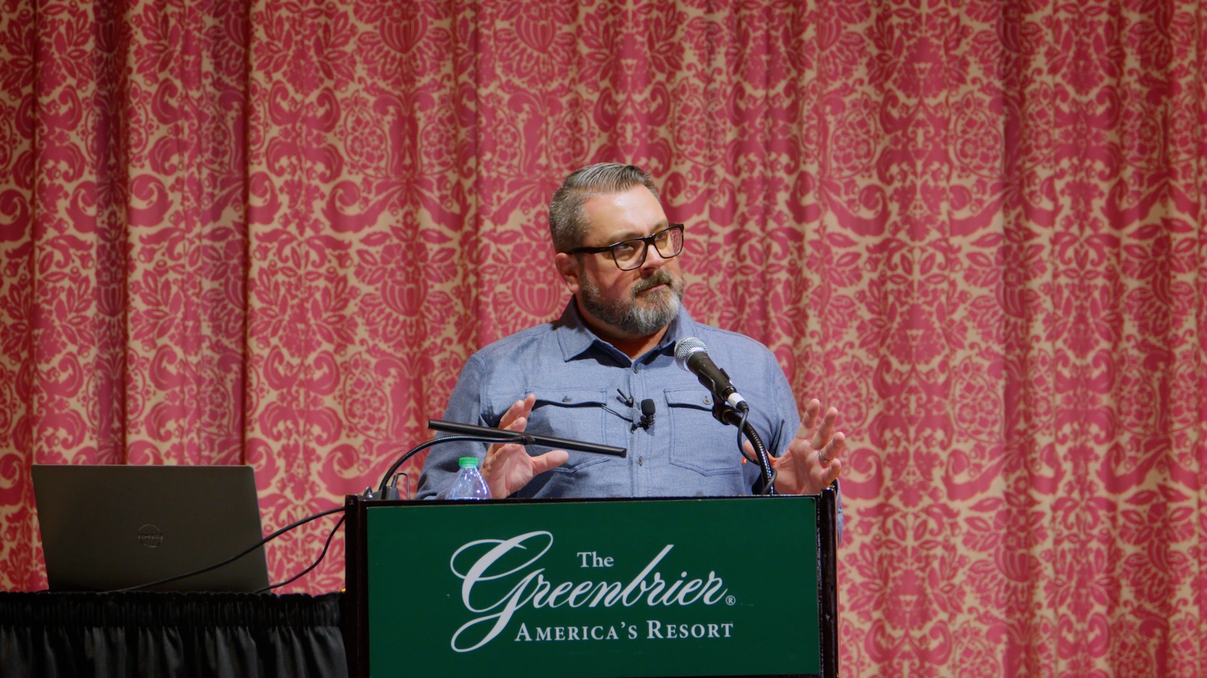 A close up of Pat Strader speaking at Hospitality U