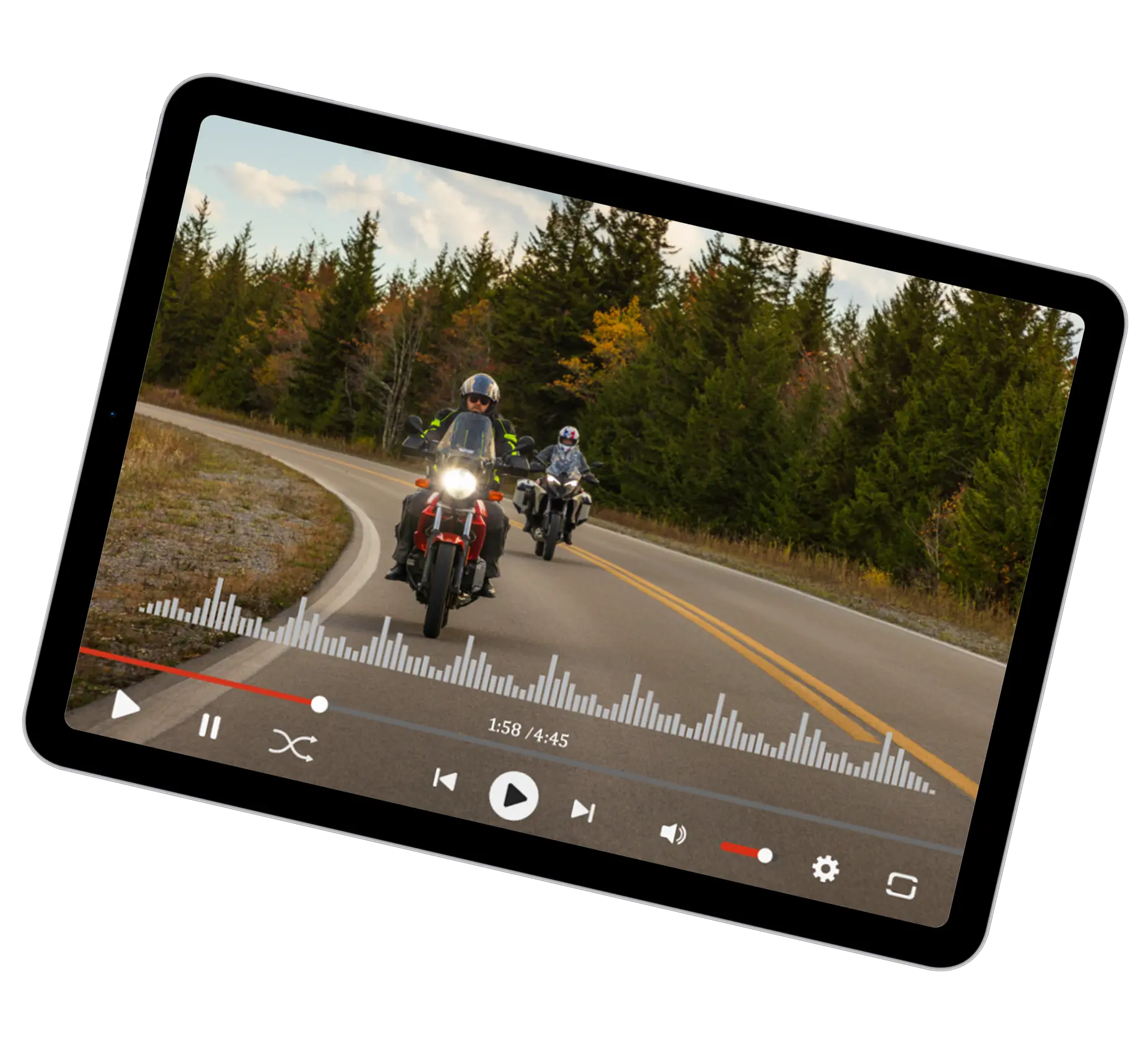 Tablet displaying a video of two motorcyclists riding on a winding road through a forested area.