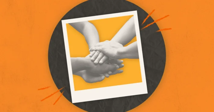 A halftone photograph of multiple hands stacked on top of one another in a Polaroid frame and set against an orange background.